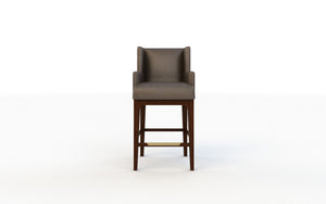 Brown bar stool with gray cushion on a white background