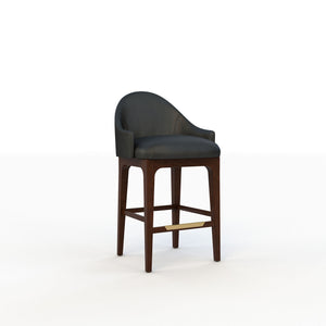 Bar stool with black cushioned seat and wooden legs on a white background