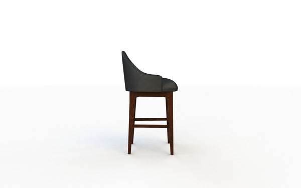 Bar stool with black seat and wooden legs on a white background