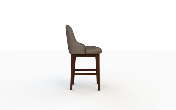 Bar stool with brown cushioned seat and wooden legs on a white background