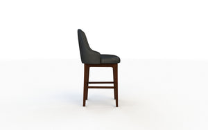 Bar stool with dark gray cushioned seat and wooden legs on a white background